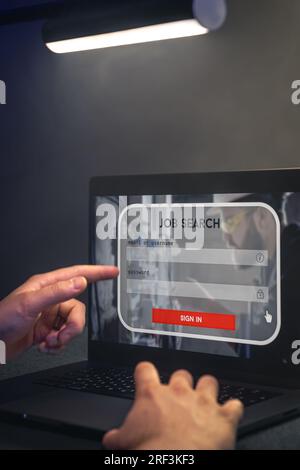 Man working on laptop and Information for the searching job, employment concept. Stock Photo