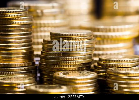 minted coins and processed to give them a Golden hue, the coins are real and used as a means of payment in Poland, the coins are old and have some def Stock Photo