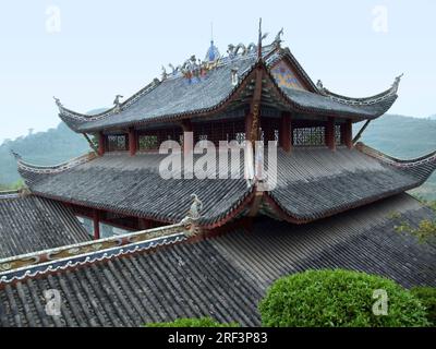 decorative roof of a traditional building in a historic district named 'Fengdu County' in China Stock Photo