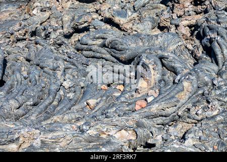 Variety of forms of basalt solidified ropy lava (clinker, block-lava): hawaiian is main type of lava. Paehoehoe. Kamchatka, Russia Stock Photo