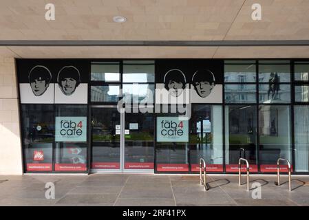 Entrance to the Fab 4 Cafe, related to the Beatles Museum, in the Modernist Pier Head Ferry Terminal Building (2009) on the Waterfront Liverpool UK Stock Photo