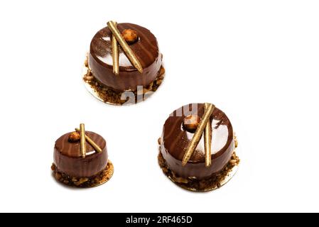 Chocolate and caramel cake isolated on a white background. Top view. Stock Photo