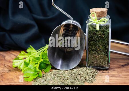 Fresh green parsley or dried and rubbed parsley Petroselinum crispum Stock Photo
