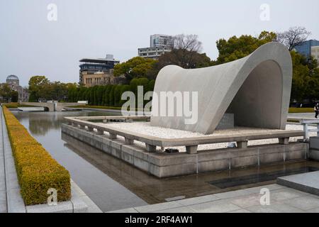 Hiroshima, Japan. 9th Mar, 2023. A view of Hiroshima Peace Memorial Park (åºƒå³¶å¹³å'Œè¨˜å¿µå…¬åœ'), and the Memorial Cenotaph facing towards the Peace Flame in the foreground. The Peace flame is an eternal flame that will remain lit until nuclear weapons are abolished. The park bears numerous monuments to the Atomic Bombing of Hiroshima on August 6, 1945 when U.S. Allied forces dropped the first atomic bomb ''Little Boy'' from a B-29 Stratofortress heavy bomber. (Credit Image: © Taidgh Barron/ZUMA Press Wire) EDITORIAL USAGE ONLY! Not for Commercial USAGE! Stock Photo
