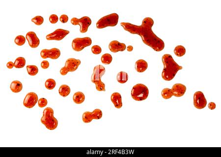 Red jam splashes isolated on a white background. Top view. Stock Photo