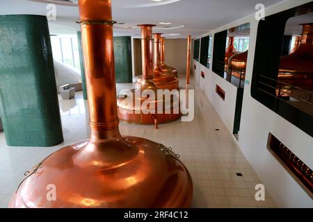 Vintage copper kettle in brewery. Traditional copper distillery tanks in beer brewery, brew kettle for beer, Pilsen, Czech Republic Stock Photo