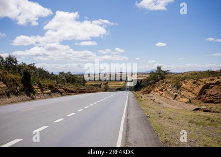 Great Rift Valley Kenya Landscapes Savannah Grassland Narok County Mai Mahiu View point Kenya Roads highway Ntulele Wheat Farm Mountains Hills Plants Stock Photo