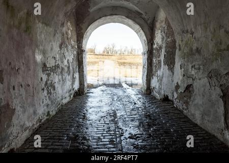 End of an empty tunnel on a sunny day, abstract architecture photo Stock Photo