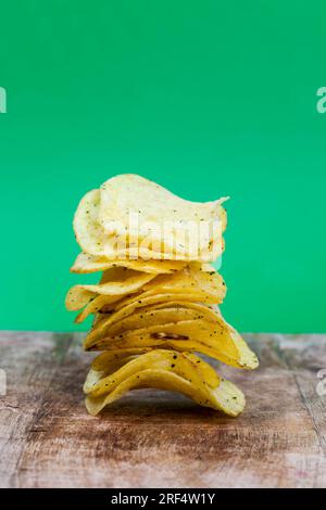 crispy chips made from potatoes and deep fried, thin potato chips, potato chips with salt and spices added to enhance the taste Stock Photo