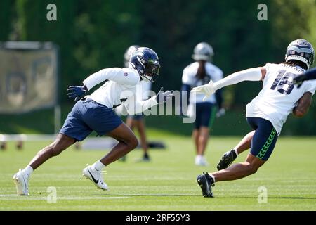 Seattle Seahawks cornerback Devon Witherspoon (21) talks with cornerback  Lance Boykin (29) during the NFL football team's rookie minicamp, Friday,  May 12, 2023, in Renton, Wash. (AP Photo/Lindsey Wasson Stock Photo - Alamy