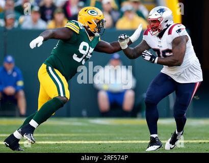 Green Bay Packers defensive end Dean Lowry (94) is blocked by Detroit Lions  offensive tackle Penei Sewell (58) during the first half of an NFL football  game Sunday, Nov. 6, 2022, in