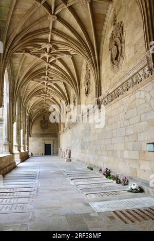 Covered walkway with graves in the cathedral cloisters Santiago de Compostela Archcathedral Basilica Santiago de Compostela Galicia Spain Stock Photo