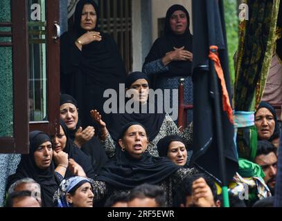 Kashmiri Shiite Muslims chant religious slogans as they participate in ...