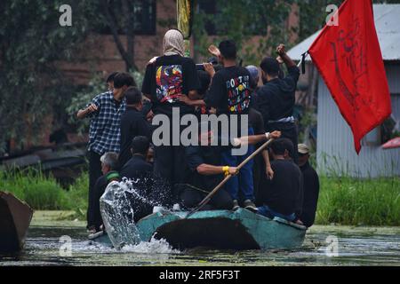 Kashmiri Shiite Muslims chant religious slogans as they participate in ...