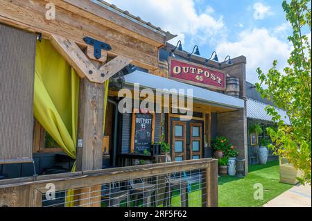 NEW ORLEANS, LA, USA - JULY 29, 2023: Front of Outpost 45 Restaurant on Harrison Avenue in the Lakeview Neighborhood Stock Photo