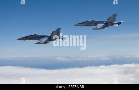 McDonnell Douglas CF-18 Hornets over western Canada Stock Photo