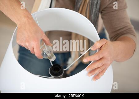 power save led lamp changing Stock Photo