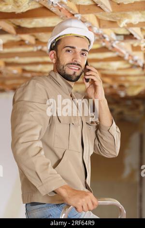 male engineer hands working with blueprints on table Stock Photo