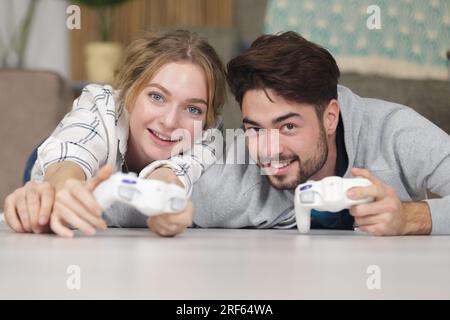 young couple playing video games Stock Photo