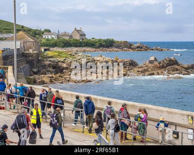 Passenger arriving at Hugh Town Harbour, st Marys, Isles of Scilly, Cornwall, England, UK, GB. Stock Photo