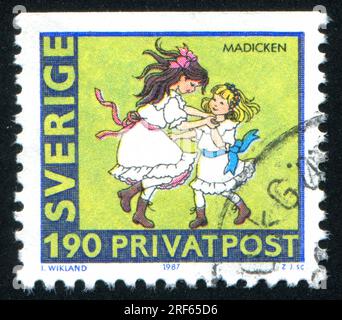 SWEDEN - CIRCA 1987: stamp printed by Sweden, shows Girls, circa 1987 Stock Photo