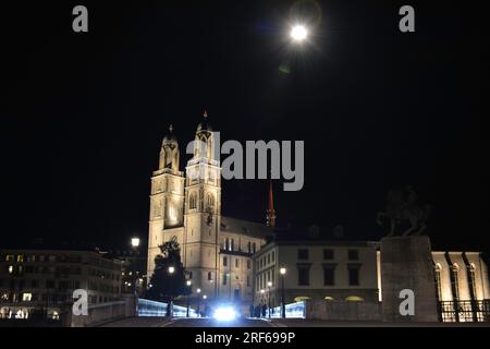 The Grossmunster under the Moonlight - Night in Zurich, Switzerland Stock Photo