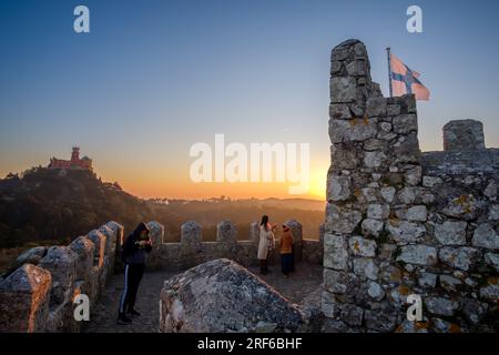 Sintra, Portugal - January 5,  2020 : View of the ruins of the Castelo dos Mouros, the Castle of the Moors and the Peña palace in the background Stock Photo