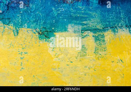 National flag of the country of Ukraine in Acrylic painted grunge style, blue and yellow abstract texture background Stock Photo