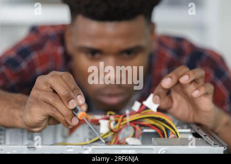 close view of precision work on dismantled computer Stock Photo
