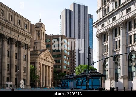 View of Foley Square, a street intersection in the Civic Center of Lower Manhattan, New York City, featuring Thomas Paine Park Stock Photo