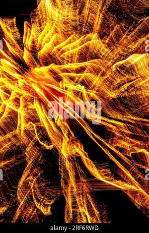 Abstract 5-second long exposure of public firework display celebrating the 14th of July in France - La Roche Posay, Vienne (86), France. Stock Photo