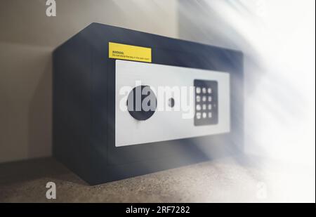 Black small home or hotel safe with keypad. Stock Photo