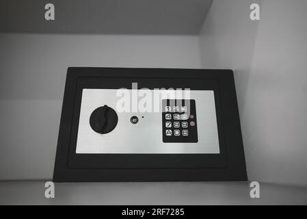 Black small home or hotel safe with keypad. Stock Photo