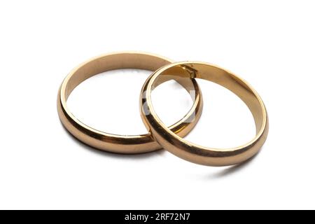 Gold wedding rings isolated on white background Stock Photo