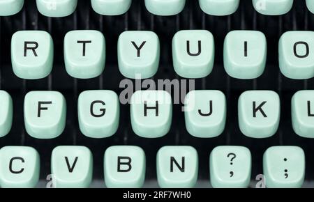 Top view of green retro typewriter keys Stock Photo