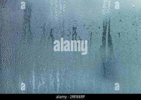 Drops of water on the misted glass background Stock Photo