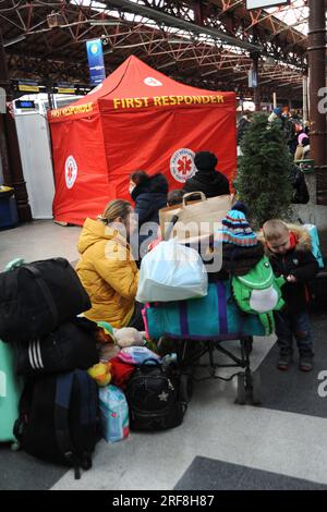 Reception of refugees from Ukraine at Bucharest North station. Support for women, children, families by associations and social services of the city. Stock Photo