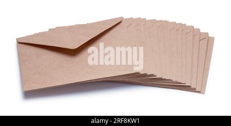 Sliding Pile of Brown Envelopes Cut Out on White. Stock Photo