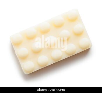 Small Bar of Hotel Soap Cut Out on White. Stock Photo
