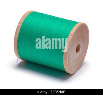 Spool of Green Thread Cut Out on White. Stock Photo