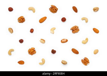 Background from different types of nuts and seeds. Isolated on white background. Flat lay, top view Stock Photo