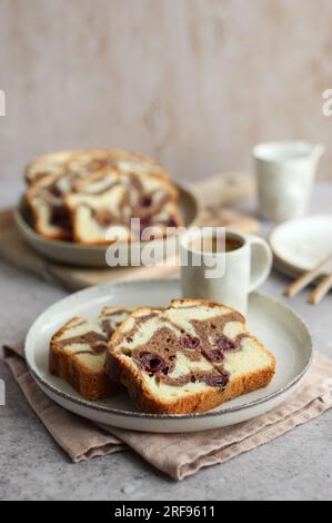 Cherry Chocolate Marble Cake. Cup of coffee. Delicious easy dessert. Stock Photo