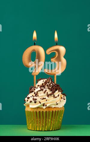 Birthday candle number 93 - Vertical anniversary card with green background Stock Photo