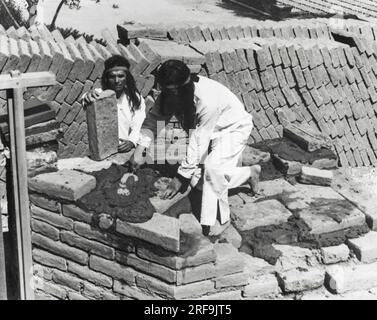 California: c. 1930 The padres taught the Indians to make the adobe ...