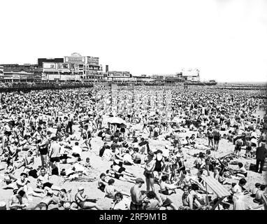 New York, New York:  c. 1938 The crowds at Coney Island Beach in New York City Stock Photo