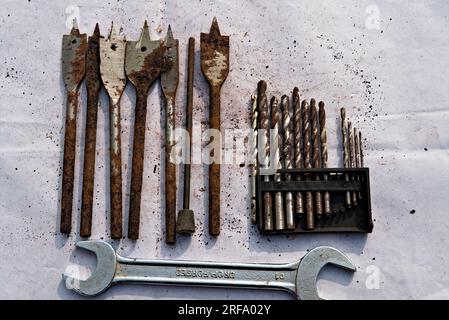 old rusted brown colored iron pieces and dust Stock Photo