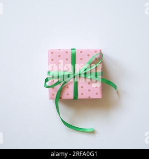 Pink dot pattern gift box isolated on white background. top view, copy space Stock Photo