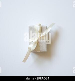 Silver glitter gift box isolated on white background. top view, copy space Stock Photo