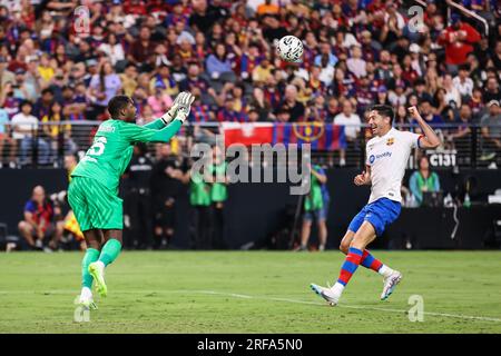 August 1, 2023: FC Barcelona forward Robert Lewandowski (9) follows the ball towards AC Milan goalkeeper Mike Maignan (16) during the second half of the 2023 Soccer Champions Tour featuring FC Barcelona vs AC Milan at Allegiant Stadium on August 1, 2023 in Las Vegas, NV. Christopher Trim/CSM. Stock Photo