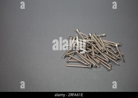 screws macro photo, screw background, metal screw, steel screw, screw macro, repair screws Stock Photo